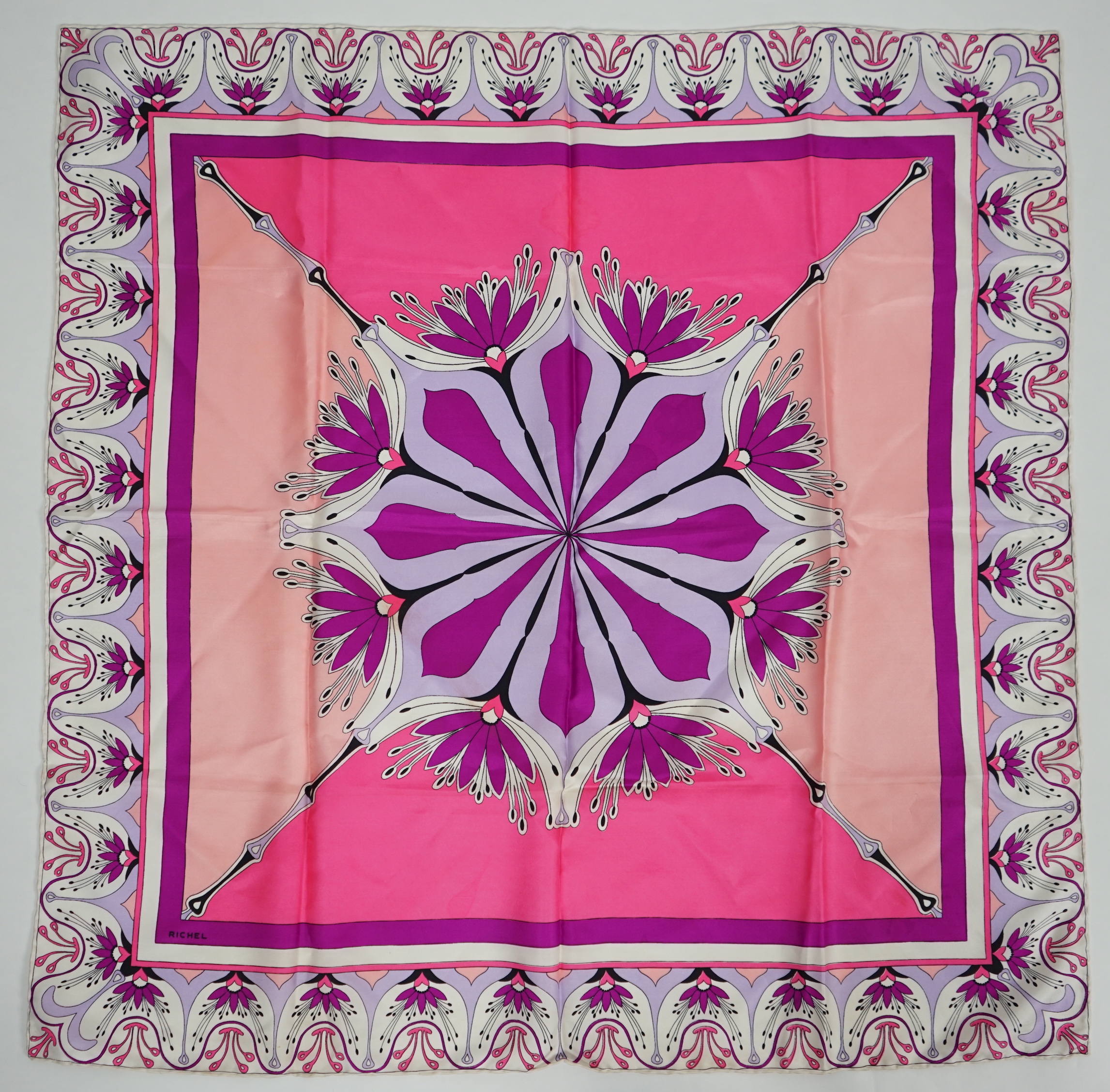 A selection of Yves Saint Laurent, two Christian Dior, Richel and Loewe silk scarves, YSL, 83cm x 85cm Christian Dior: 84cm x 80cm Richel: 87cm x 87cm Loewe: 86cm x 82cm Christian Dior large scarf 120cm x 130cm approx.